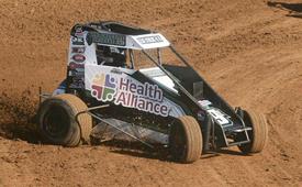 Schuett makes big gains during rain shortened