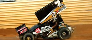 Henderson and Sandvig Overcome Adversity to S