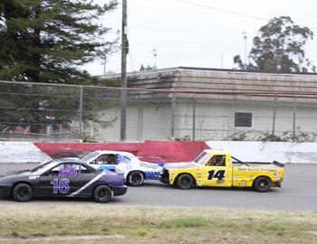 #16 Eric OFerrall, #85 C.J. Dalton and #14 Jarrett Mayo race tight in mini stock action.