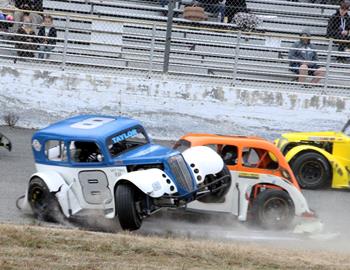 #8 Scott Taylor spins and catches air after getting hit by #3 Andy Thornton