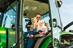 Great Nieces first Tractor Ride with Grandpa