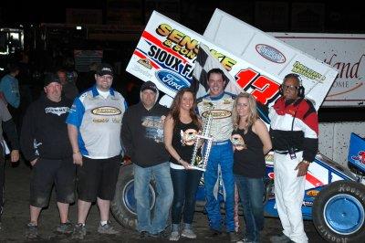 Mark and crew in victory lane at Huset's
