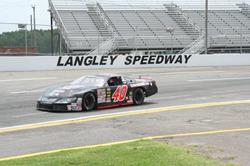 C.E. Falk gains eighth win of Langley season, but his twin sweep is denied because of missing weights