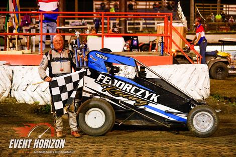 Chet Gerhke Gains Checkers in POWRi IMRA Victory at Macon Speedway