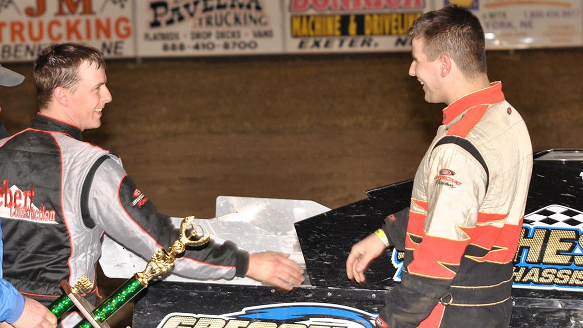 Ryan Gustin (right) is congratulated by Jon Tesch (left) after Gustin won his first USMTS main event with Gressel Racing on March 26, 2010. (Chad Ebel Photo)