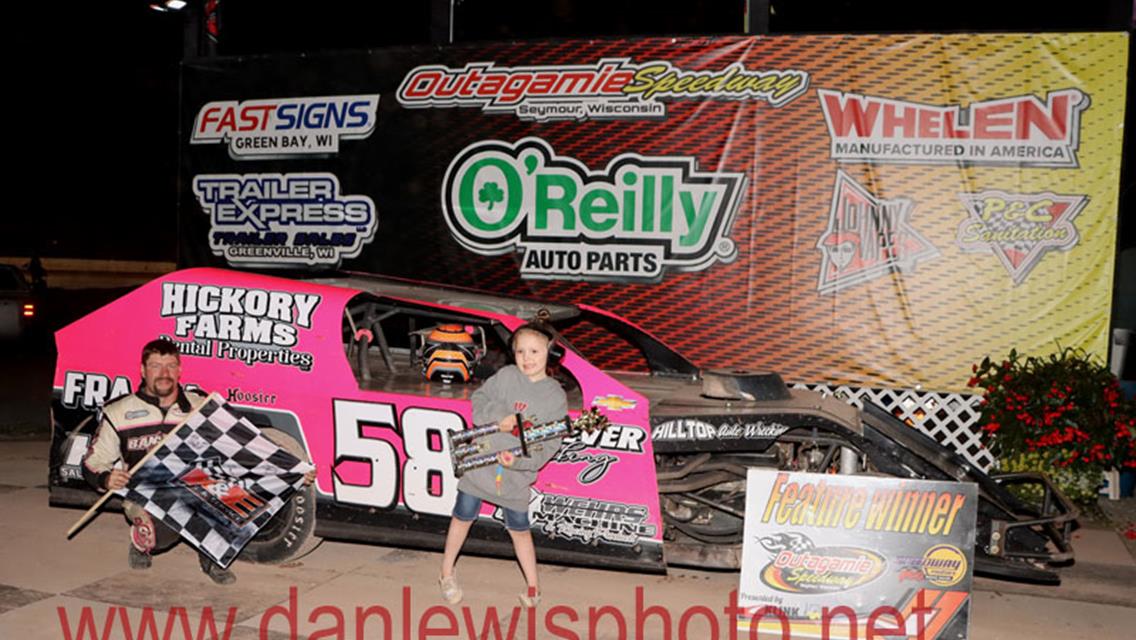 IMCA Sport Mod Rookie Coy Vlies cashes in at Outagamie Speedway.
