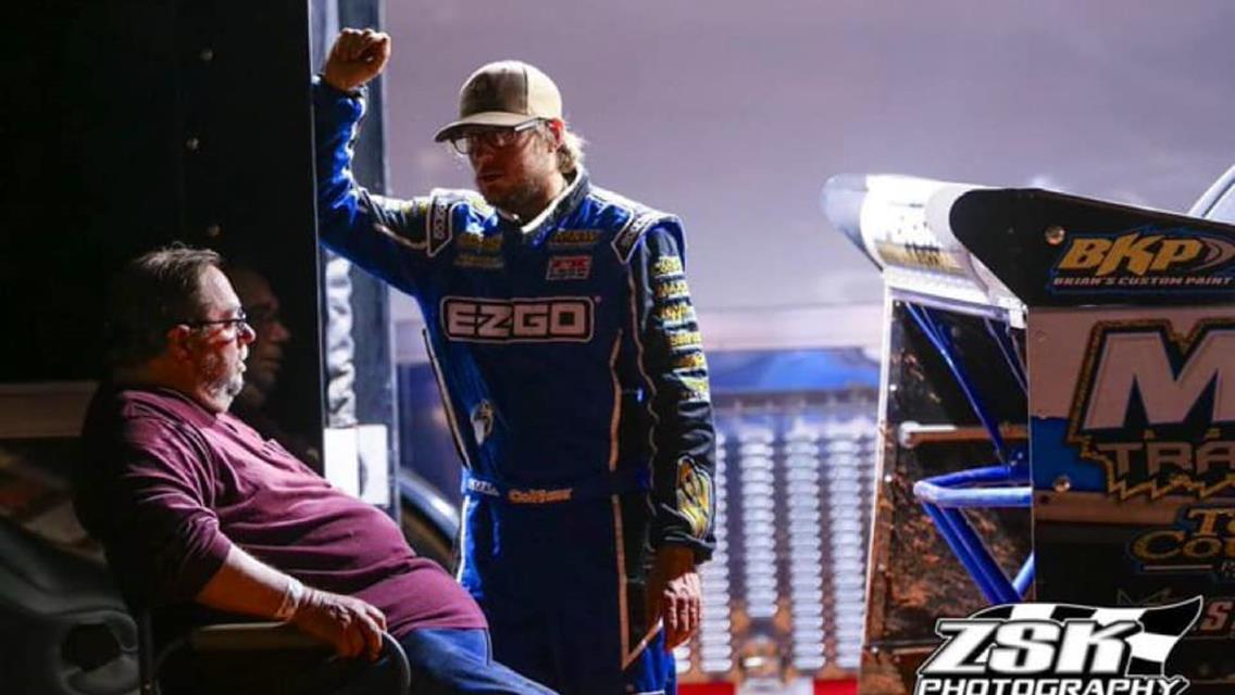 Cla and his father Ken Knight converse in the pit area. (ZSK Photography)