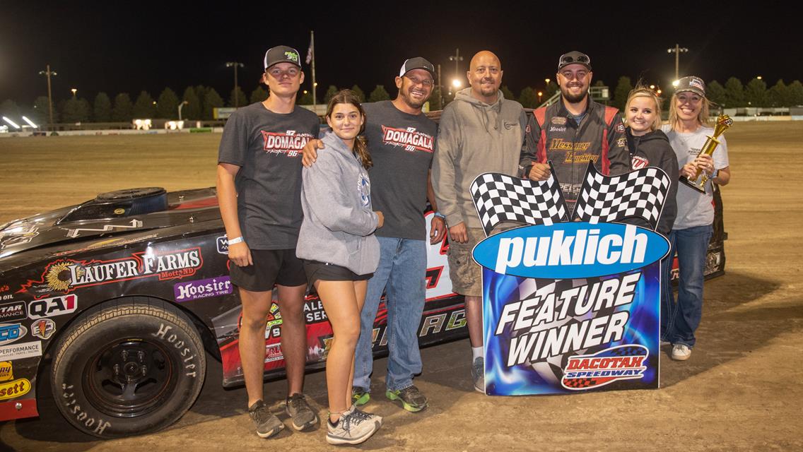 DOMAGALA WINS IN THRILLING FINISH