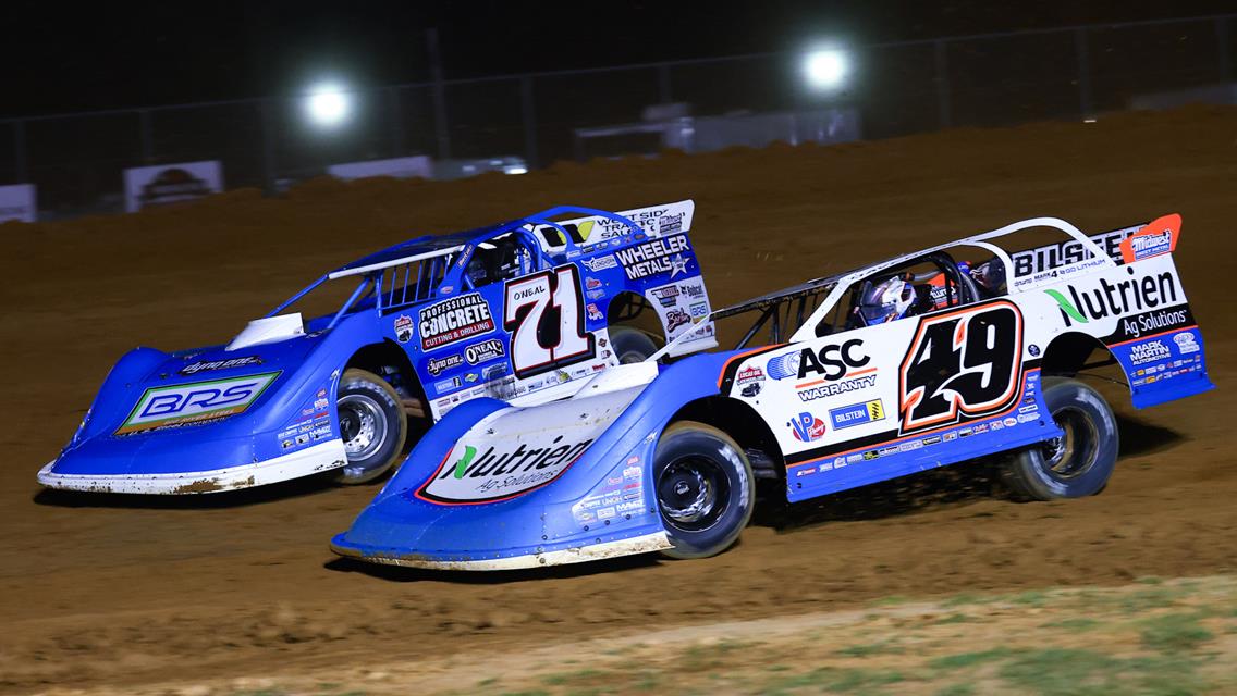 Hudson O'Neal (71) and Jonathan Davenport (49) battle for the lead at Brownstown Speedway on Sept. 25.