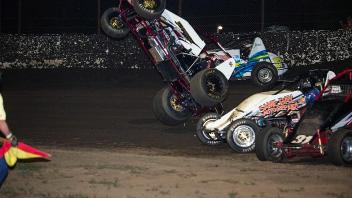 WHITE SCORES WITH SELLOUT CROWD ON HAND