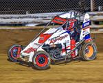 NEUMAN SURVIVES MARION MAYHEM, WINS AGAIN WITH TEA