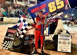 DAGGETT WINS FEATURE, GRESSMAN WIN