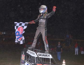 Logan Seavey #67 celebrates his win in victory lane