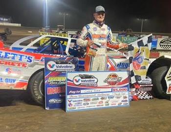 Caiden Black in victory lane after picking up the Valvoline American Late Model Iron-Man Series Fueled by VP opener at Atomic Speedway on Saturday, April 11.