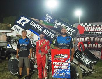 Bill Balog and Rhine Auto Motorsports Crew in Victory Lane