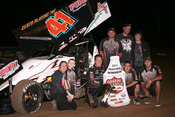Jason Johnson and the JJR No. 41 crew in Lucas Oil ASCS presented by K&N Filters victory lane after topping Saturday night's 35-lap Cottage Grove Sprint Car Nationals finale. (Stacy Verrall photo)