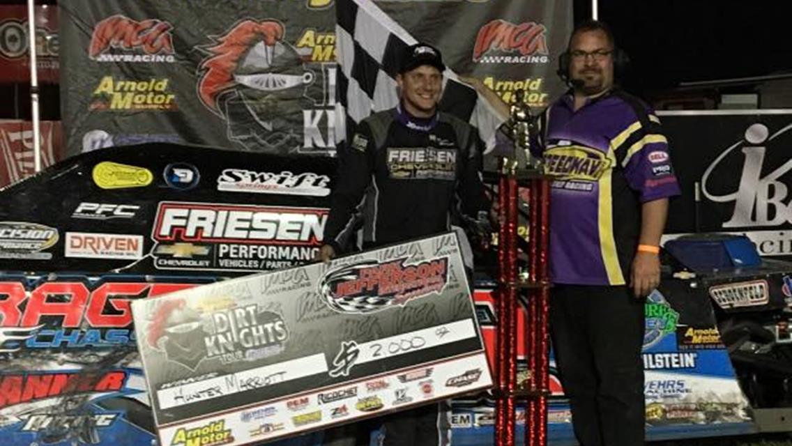 Dirt Knight Hunter Marriot pillages the loot at Park Jefferson Speedway