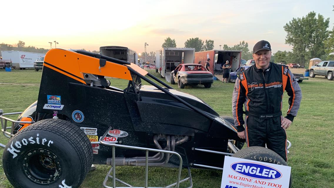 GALAJDA TAKES THE CHECKERED FLAG